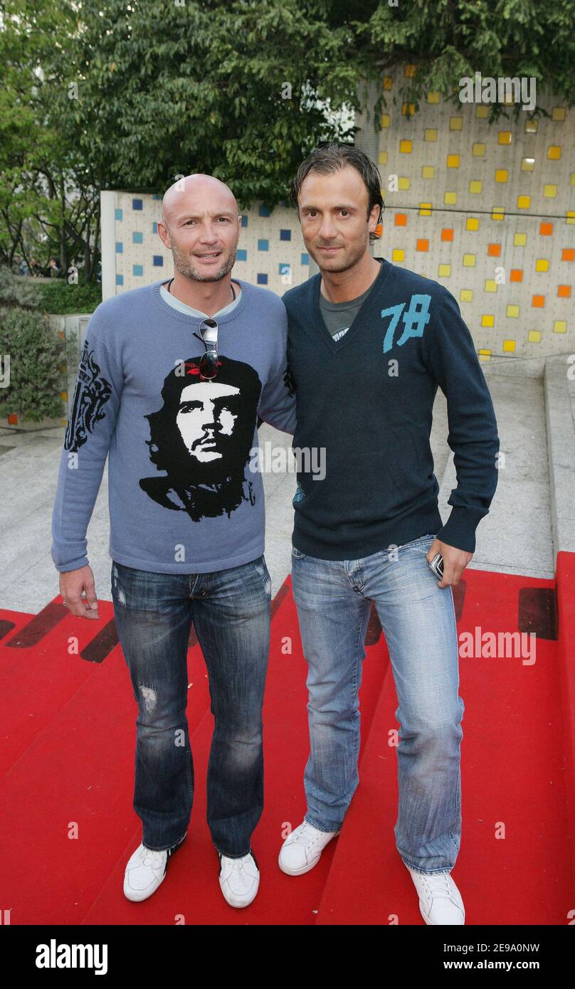 French soccer players Franck Leboeuf (L) and Christophe Dugarry arrive at La Defense, Paris business district on April 26, 2006 to attend the Premiere of his latest movie ' Mission Impossible III'. Photo by Nebinger-Orban/ABACAPRESS.COM Stock Photo