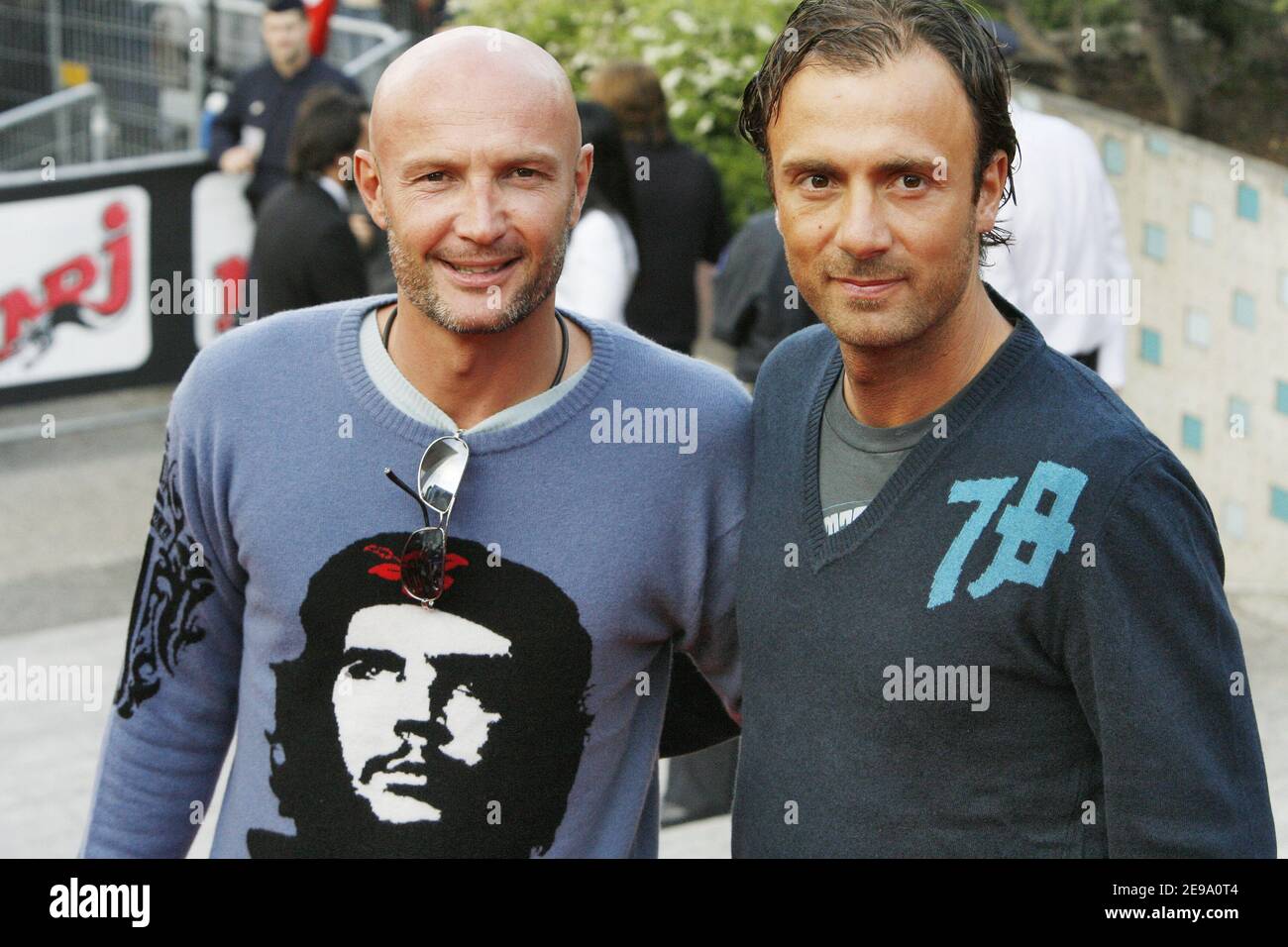 French soccer players Franck Leboeuf (L) and Christophe Dugarry arrive at La Defense, Paris business district on April 26, 2006 to attend the Premiere of his latest movie ' Mission Impossible III'. Photo by Nebinger-Orban/ABACAPRESS.COM Stock Photo