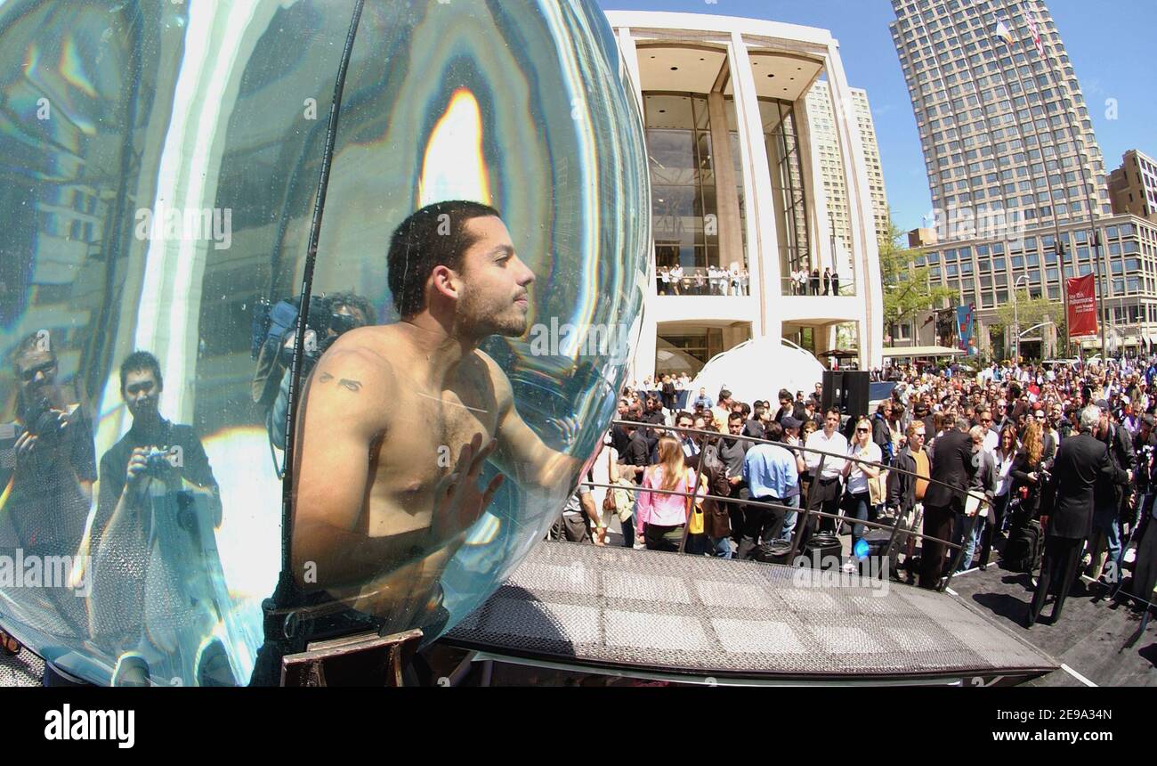 Performance artist and magician David Blaine begins his Performance artist and magician David Blaine begins his
