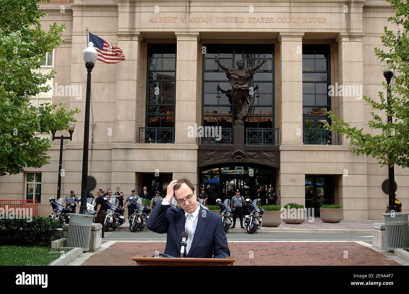 Court Public Information Officer Ed Adams announces that the jury sentenced self-professed al-Qaida terrorist Zacarias Moussaoui to life in prison May 3, 2006 in front of the federal court building in Alexandria, Virginia. Adams read all the counts against Moussaoui and announced the jury's decision on each. Photo by Olivier Douliery/ABACAPRESS.COM Stock Photo