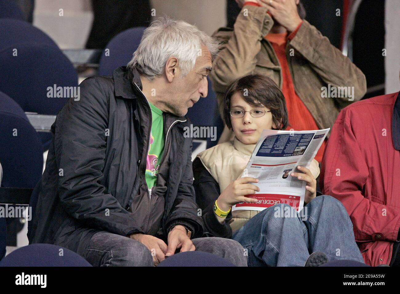 French actor Gerard Darmon and his son attend the French first league football match Paris Saint-Germain vs Ajaccio at the Parc des Princes in Paris, France, on May 6, 2006. Ajaccio won 4-2. Photo by Laurent Zabulon/ABACAPRESS.COM Stock Photo