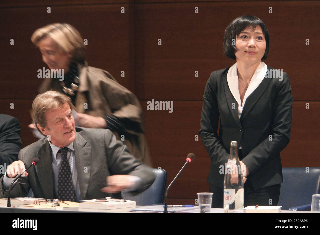 EXCLUSIVE - Bernard Kouchner chairs the conference debate 'Cross Vietnamese Destinies' with President Jacques Chirac's adoptive daughter Anh-Dao Traxel, a Vietnamese refugee in Paris, France on May 15, 2006. Photo by Mehdi Taamallah/ABACAPRESS.COM Stock Photo