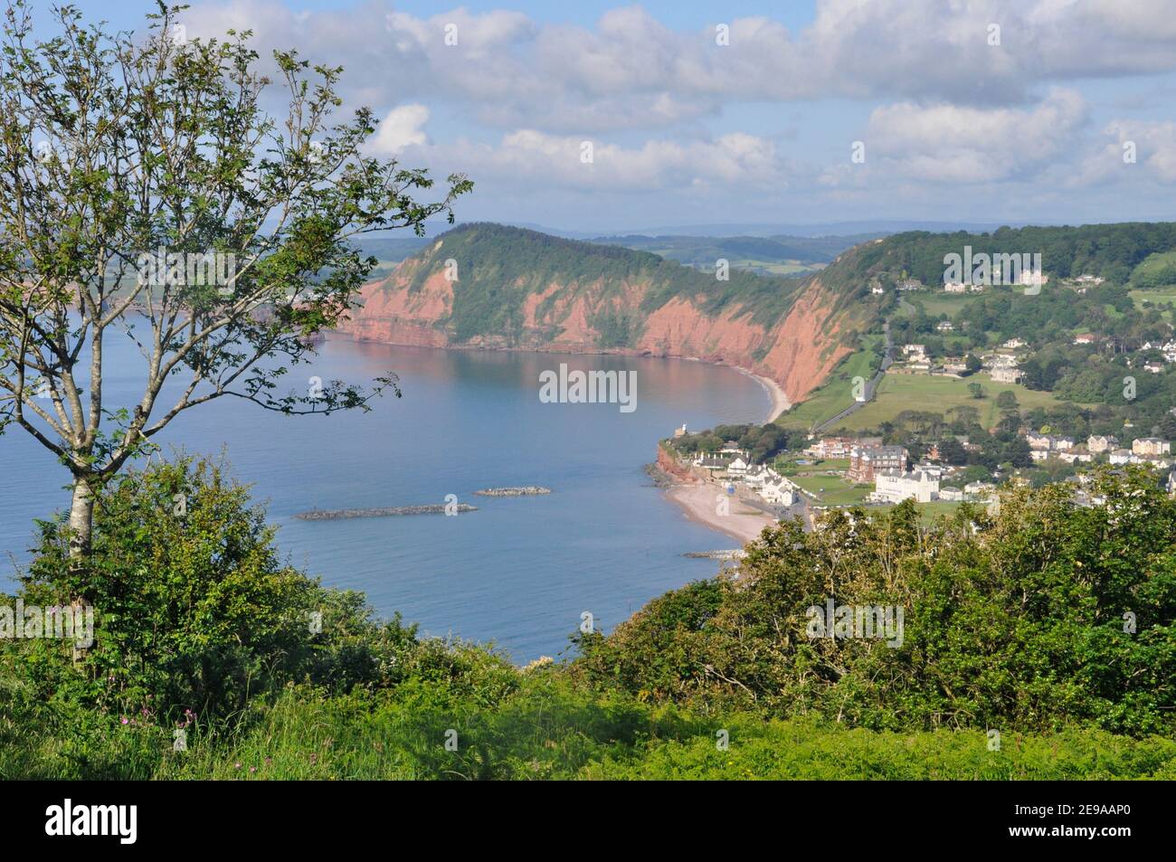 Looking west from Salcombe Hill over the town of Sidmouth towards Ladram Bay on the jurassic coast in Devon UK Stock Photo