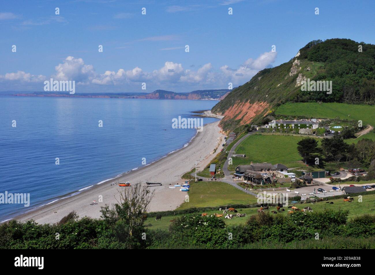 Looking west along the Jurrassic coast with the seaside village of Branscombe in the foreground.Devon. UK Stock Photo