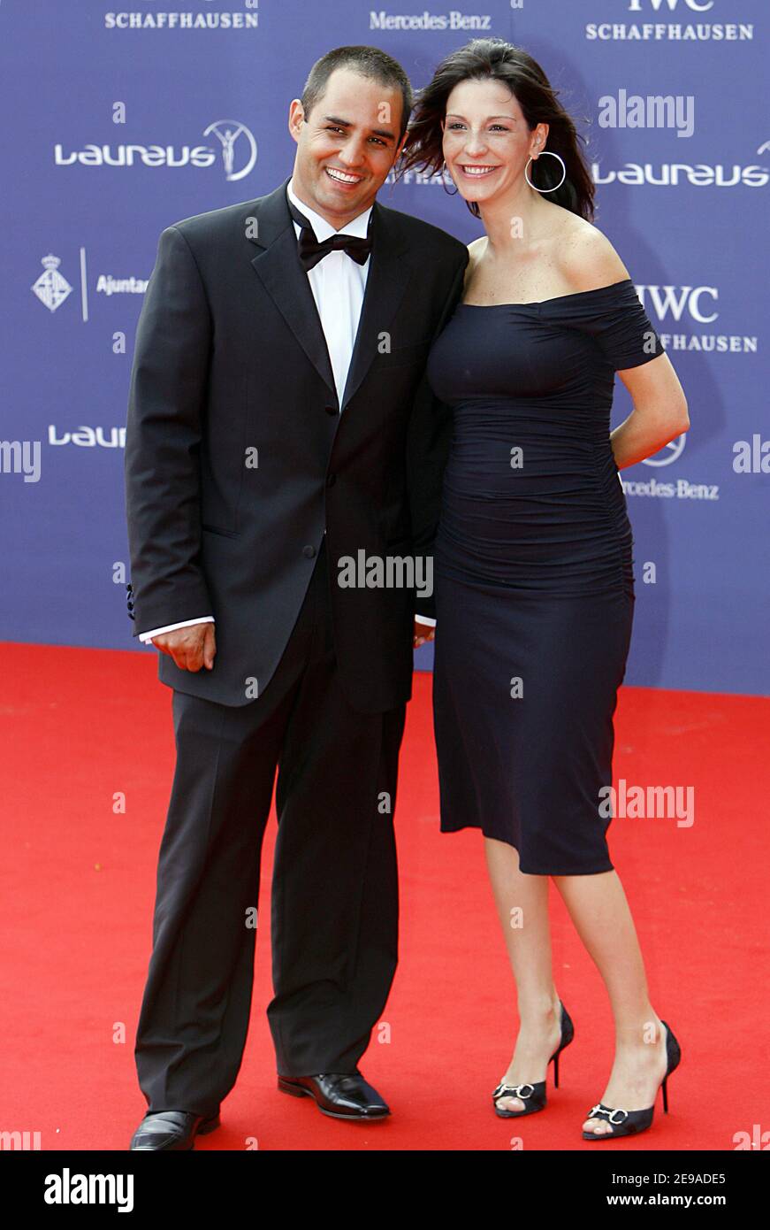 Colombian F1 driver Juan Pablo Montoya (L) arrives with partner at the Laureus World Sports Awards 2006, at the Parc del Forum, Barcelona, Spain on May 22, 2006.Photo by Patrick Bernard/ABACAPRESS.COM Stock Photo
