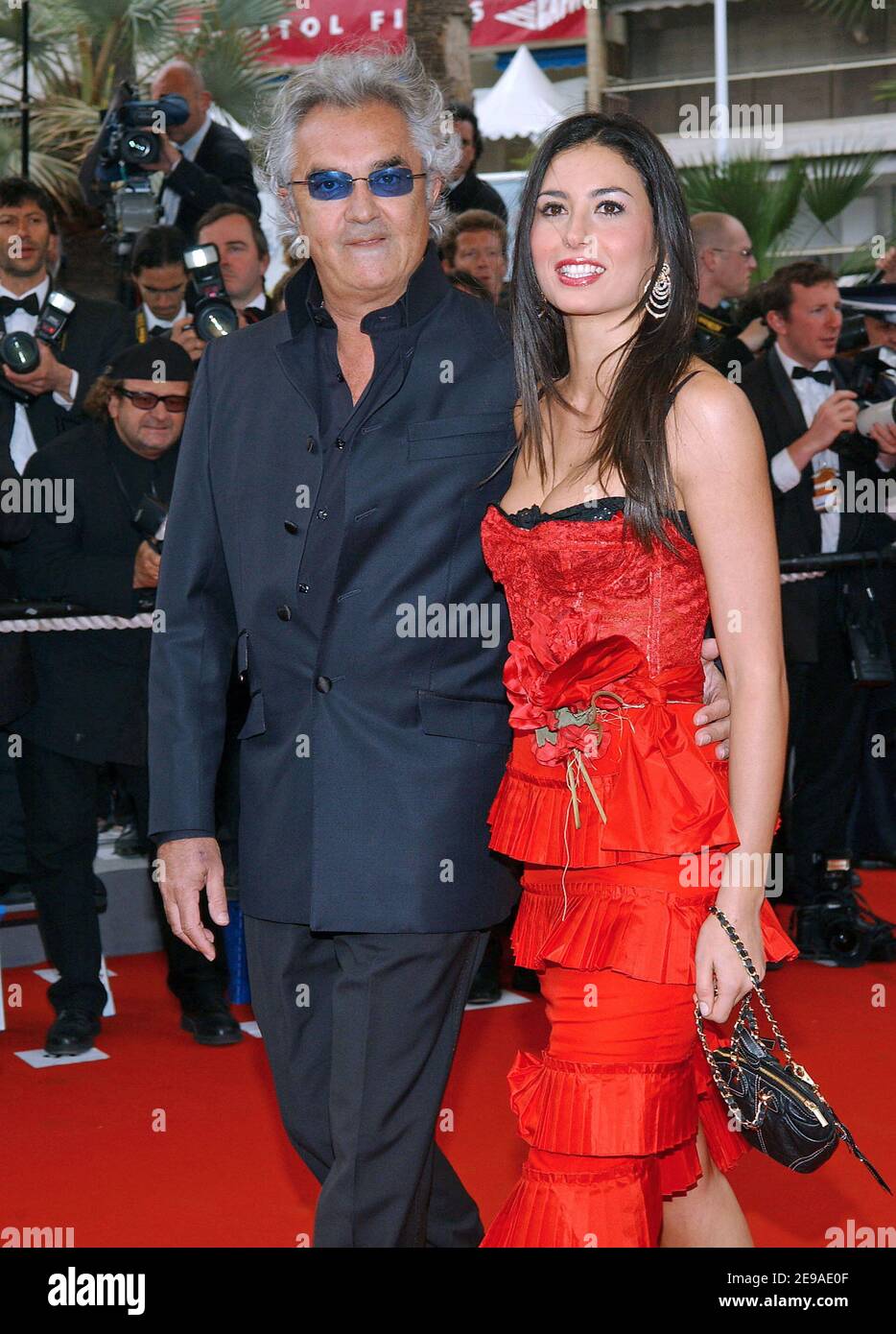 Renault Formula One managing director, Italian Flavio Briatore, and his girlfriend Elisabetta Gregoraci upon arrival for the screening of Mexican director Alejandro Gonzalez Inarritu's film, 'Babel', at the 59th Cannes Film Festival in Cannes, France, on May 23, 2006. Photo by Hahn-Nebinger-Orban/ABACAPRESS.COM Stock Photo