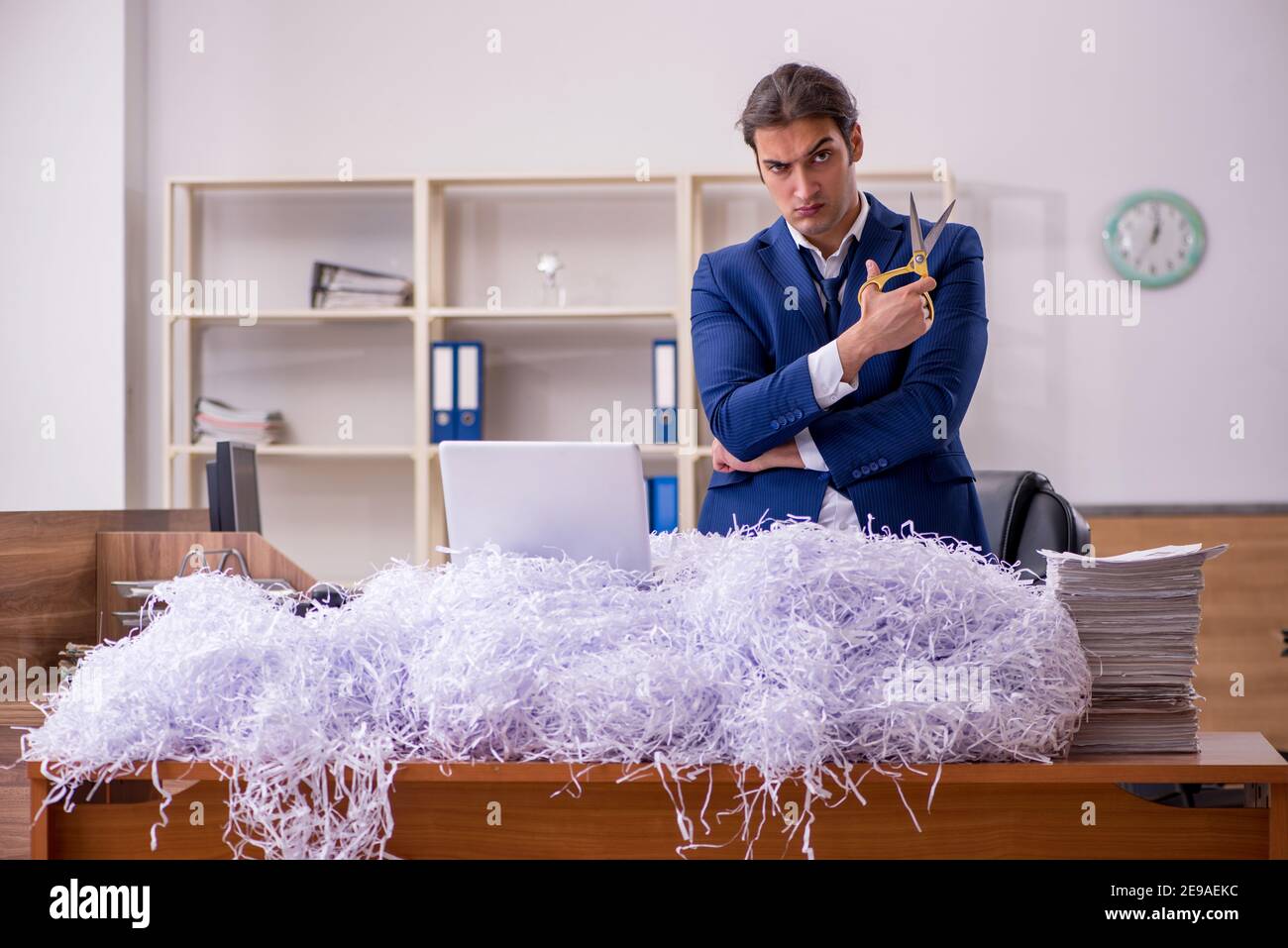 Paper shredder employee hi-res stock photography and images - Alamy