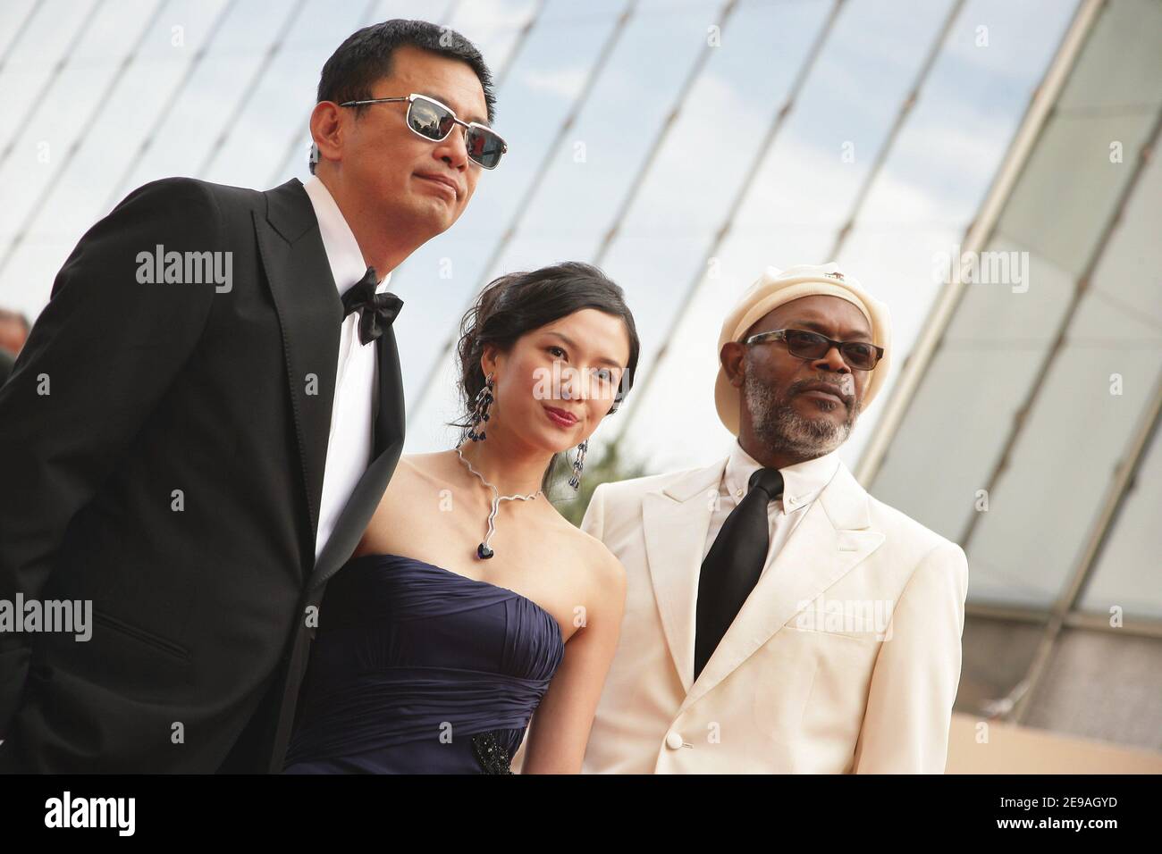 (L-R) Chinese director Wong Kar Wai, Chinese actress Ziyi Zhang and US actor Samuel L. Jackson arrive at the Palais des Festivals to attend the screening of 'Transylvania' and the award ceremony of the 59th Film Festival, in Cannes, France, on May 28, 2006. Photo by Hahn-Nebinger-Orban/ABACAPRESS.COM Stock Photo