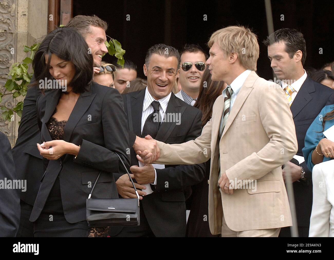 French F1 driver Jean Alesi (c) UK driver David Coulthard(L) and Finnish  driver Mika Salo attend Canadian formula one driver Jacques Villeneuve's  wedding with Johanna Martinez during a religious ceremony at the