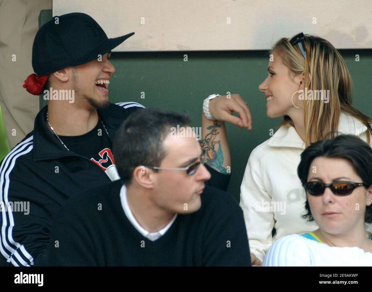 US singer Billy Crawford his girlfriend Marie Courchinoux watch a match in  Adidas stand during the French Tennis Open at Roland-Garros arena, in  Paris, France, on June 3, 2006. Photo by  Gouhier-Nebinger-Zabulon/Cameleon/ABACAPRESS.COM