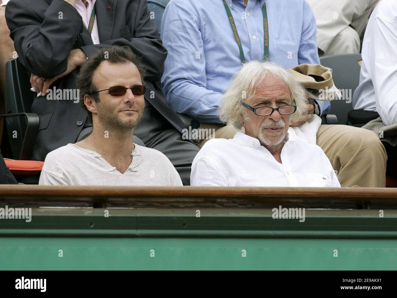 French actors Pierre-Francois Martin-Laval and Pierre Richard watch a game during the 6th day of French Open Tennis tournament held at Roland Garros stadium in Paris, France on June 3, 2006. Photo by Gouhier-Nebinger-Zabulon/ABACAPRESS.COM. Stock Photo