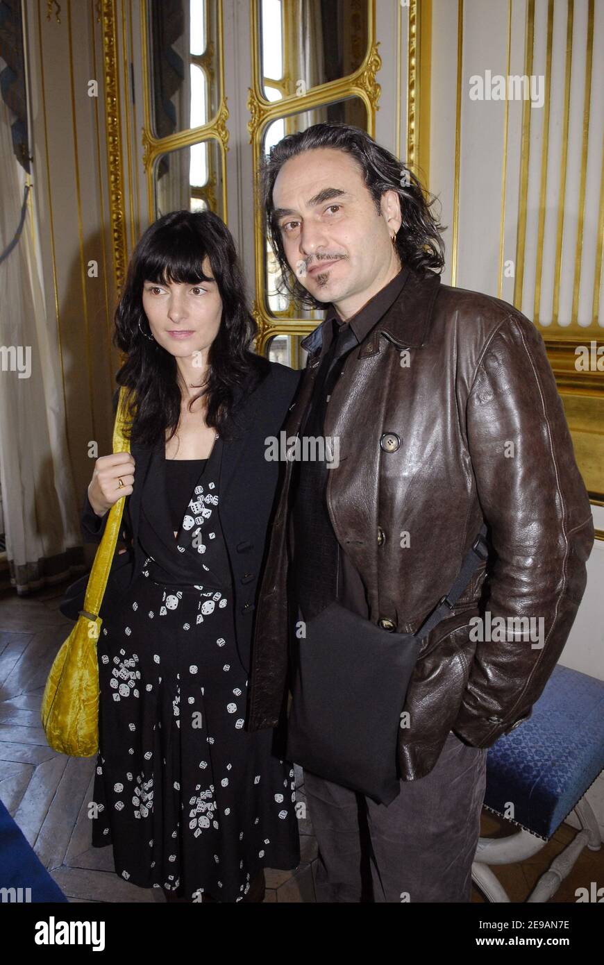 Swiss singer Stephane Eicher and his wife attend a ceremony where film director Etienne Chatilliez, humorist Sylvie Joly, musician Manu Katche and director and actor Philippe Harel were honored with the Legion of Honor by Culture Minister Renaud Donnedieu de Fabres at its Ministry in Paris on June 7, 2006. Photo by Bruno Klein/ABACAPRESS.COM Stock Photo