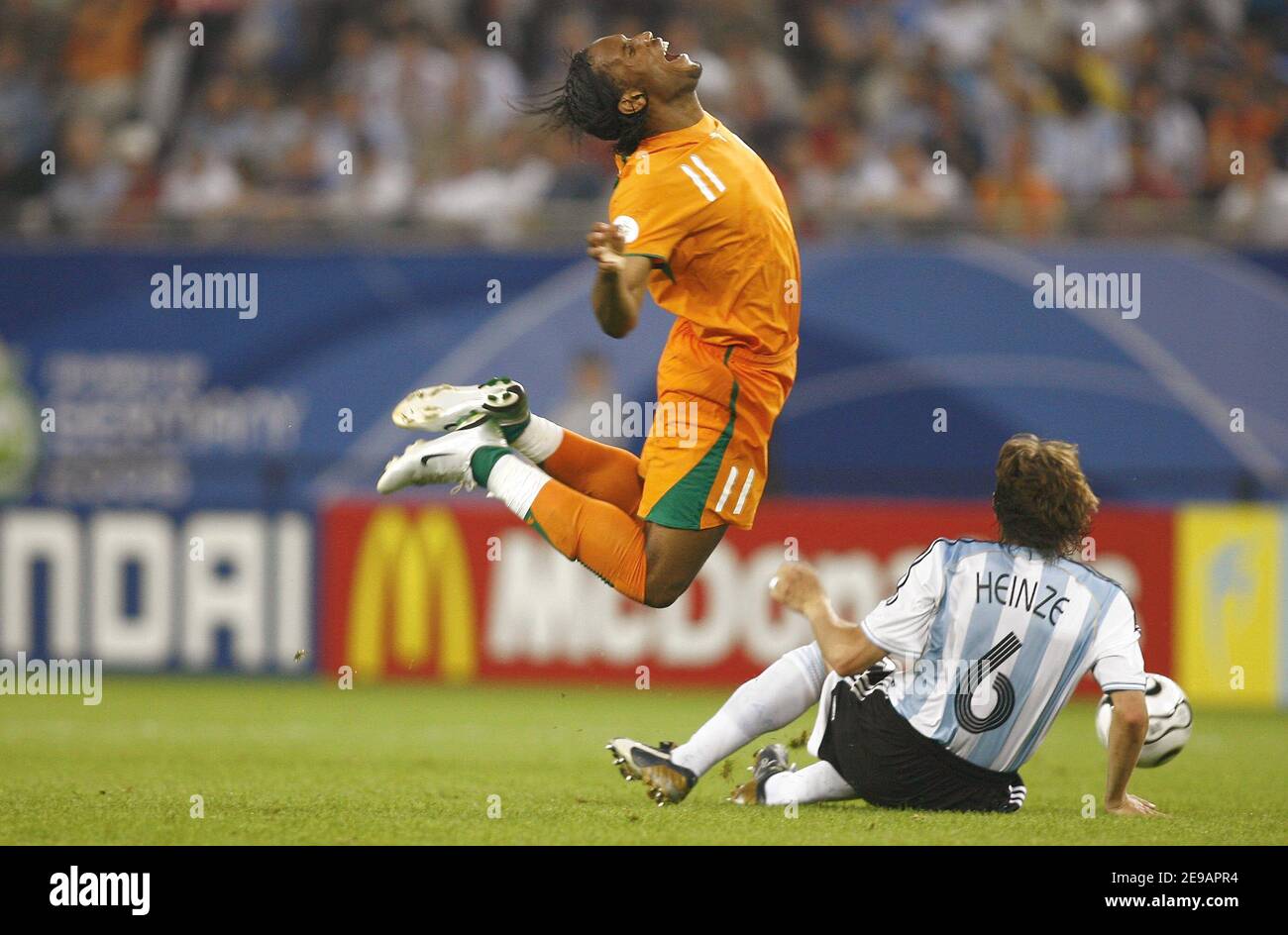 Ivory Coast's Didier Drogba and Argentina's Gabriel Heinze during the World Cup 2006, World Cup 2006, Group C, Argentina vs Ivory Coast in Hamburg, Germany on June 10, 2006. Argentina won 2-1. Photo by Christian Liewig/ABACAPRESS.COM Stock Photo