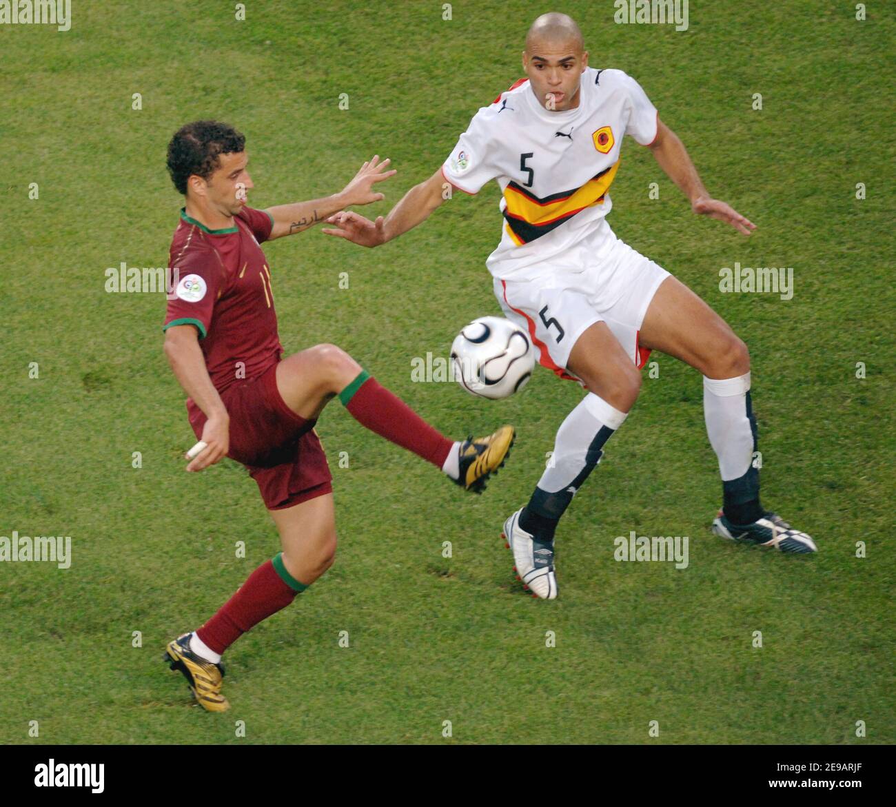 Portugal's Simao Sabrosa and Angola's Kali in action during the World Cup 2006, Group D, Angola vs Portugal in Cologne, Germany on June 11, 2006. Portugal won 1-0. Photo by Gouhier-Hahn-Orban/Cameleon/ABACAPRESS.COM Stock Photo