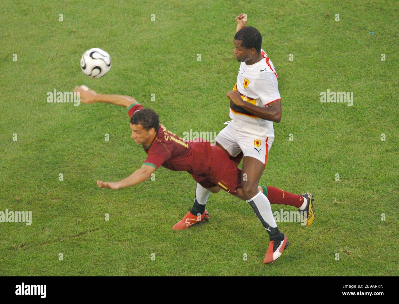 Portugal's Simao Sabrosa and Angola's Mateus in action during the World Cup 2006, Group D, Angola vs Portugal in Cologne, Germany on June 11, 2006. Portugal won 1-0. Photo by Gouhier-Hahn-Orban/Cameleon/ABACAPRESS.COM Stock Photo