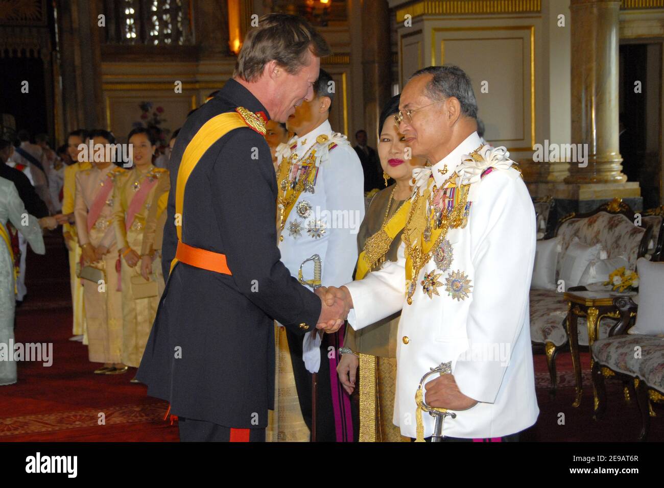 Thailand's King Bhumibol Adulyadej (R) greets Grand Duke Henri of Luxemburg at Ananda Samakhom Throne Hall on June 12, 2006 in Bangkok, Thailand. The representatives of 25 royal houses from Europe, Africa, the Middle East and Thailand's Asian neighbors trooped into the elaborate century-old hall to convey their best wishes on the 60th anniversary of the 78-year-old king's accession to the throne. Photo by Patrick Durand/ABACAPRESS.COM Stock Photo