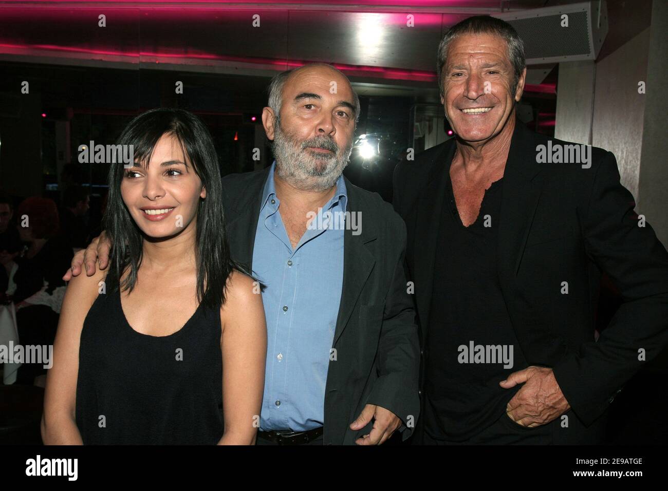 Gerard Jugnot, his girlfriend Saida Jawad and Jean-Claude Darmon attend a party to celebrate the Raphael Mezrahi's birthday at L'Etoile in Paris, France on June 12, 2006. Photo by Benoit Pinguet/ABACAPRESS.COM. Stock Photo