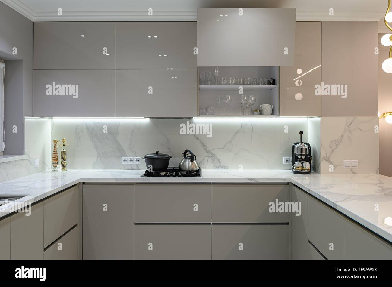 Luxury white modern marble kitchen in studio space Stock Photo Alamy