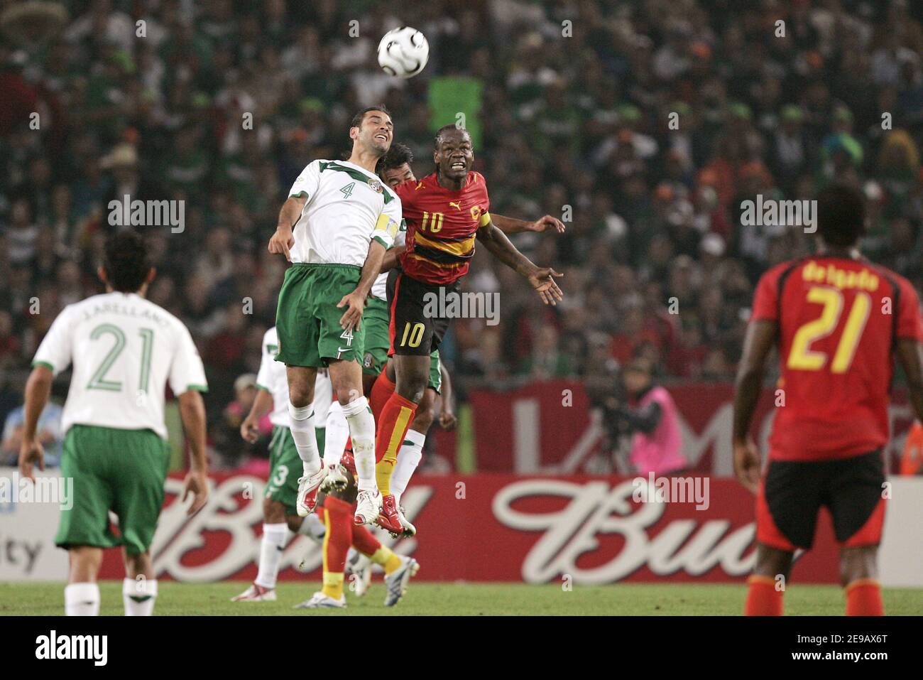 Mexico's Rafael Marquez and Angola's Akwa battle for the ball during the World Cup 2006-Group D, Angola vs Mexico, in Hanover, Germany, on June 16, 2006.The match ended in a draw 0-0. Photo by Gouhier-Hahn-Orban/Cameleon/ABACAPRESS.COM Stock Photo