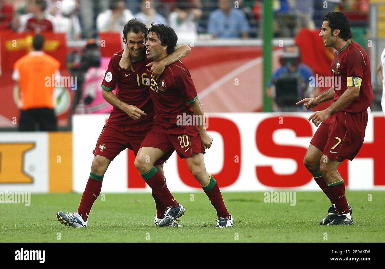 Portugal's Deco, Roberto Carvalho and Luis Figo celebrate the victory during the World Cup 2006, Portugal vs Iran at the Fifa World Cup Stadium in Frankfurt, Germany on June 17, 2006. Portugal won 2-0. Photo by Christian Liewig/ABACAPRESS.COM Stock Photo