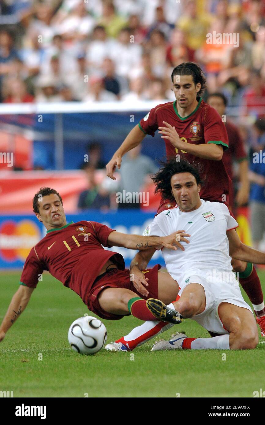 Portugal's Hugo Viana and Javad Nekounam in action during the World Cup 2006, Portugal vs Iran at the Fifa World Cup Stadium in Frankfurt, Germany on June 17, 2006. Portugal won 2-0. Photo by Gouhier-Hahn-Orban/Cameleon/ABACAPRESS.COM Stock Photo