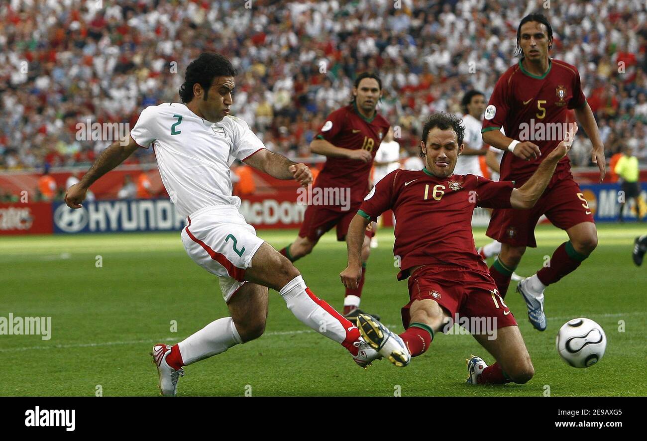 Iran's Medhdi Mahdavikia and Portugal's Ricardo Carvalho battle or the ball during the World Cup 2006, Portugal vs Iran at the Fifa World Cup Stadium in Frankfurt, Germany on June 17, 2006. Portugal won 2-0. Photo by Christian Liewig/ABACAPRESS.COM Stock Photo