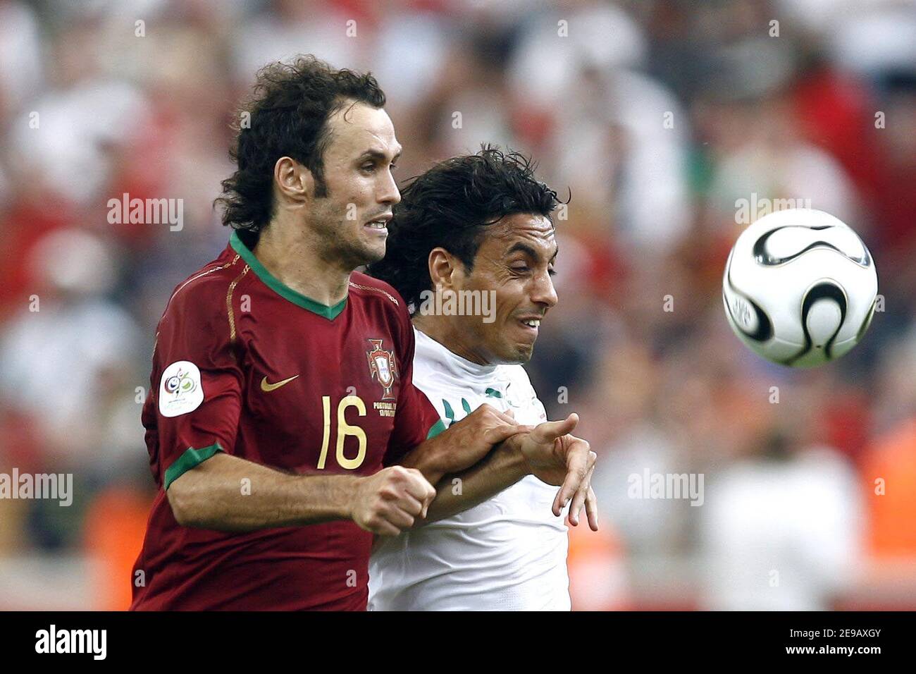 Iran's Rasoul Khatibi and Portugal's Ricardo Carvalho battle for the ball during the World Cup 2006, Portugal vs Iran at the Fifa World Cup Stadium in Frankfurt, Germany on June 17, 2006. Portugal won 2-0. Photo by Christian Liewig/ABACAPRESS.COM Stock Photo