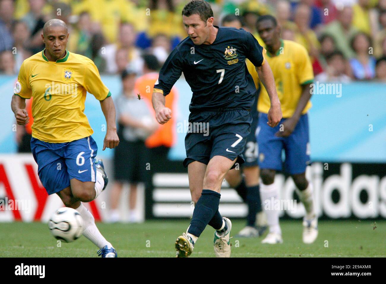 Brazil's Roberto Carlos and Australia's Brett Emerton during the World Cup 2006, Group F, Brazil