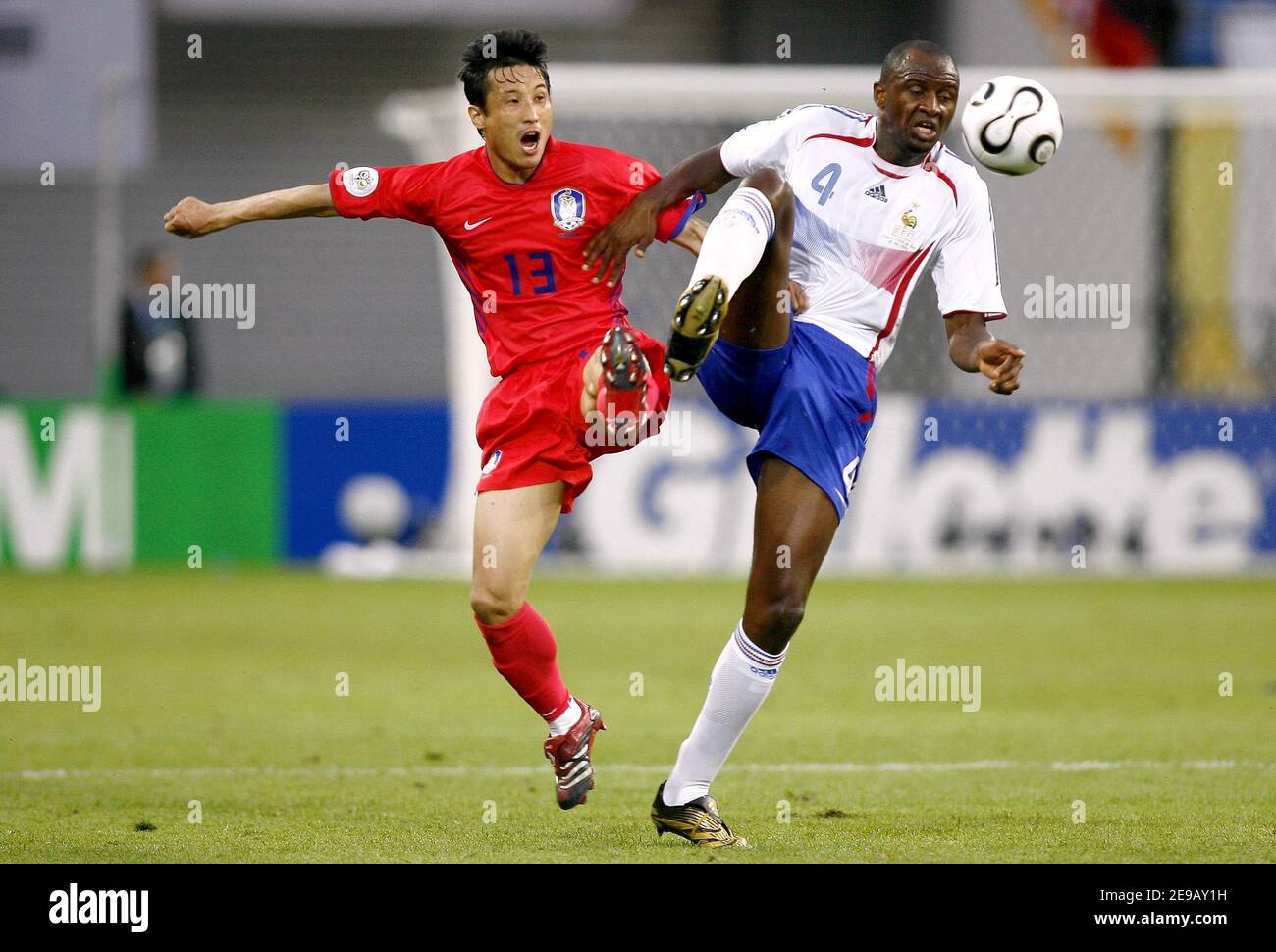 France's Patrick Vieira and South Korea's Eul-yong Lee battle for the ball during the World Cup 2006, Group G France vs South Korea, in Leipzig, Germany, on June 18, 2006. The game ended in draw 1-1. Photo by Christian Liewig/ABACAPRESS.COM Stock Photo