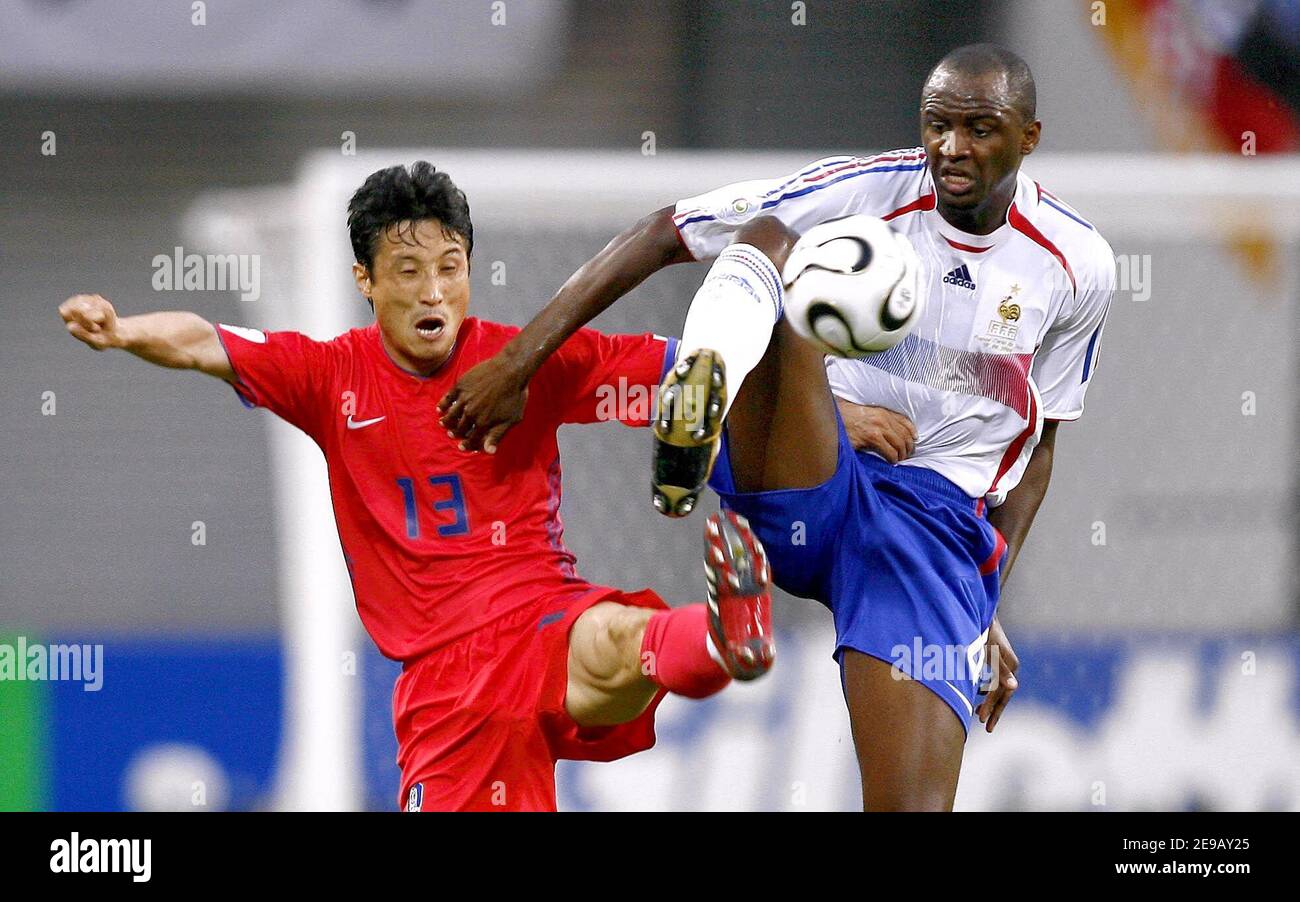 France's Patrick Vieira and South Korea's Eul-yong Lee battle for the ball during the World Cup 2006, Group G France vs South Korea, in Leipzig, Germany, on June 18, 2006. The game ended in draw 1-1. Photo by Christian Liewig/ABACAPRESS.COM Stock Photo