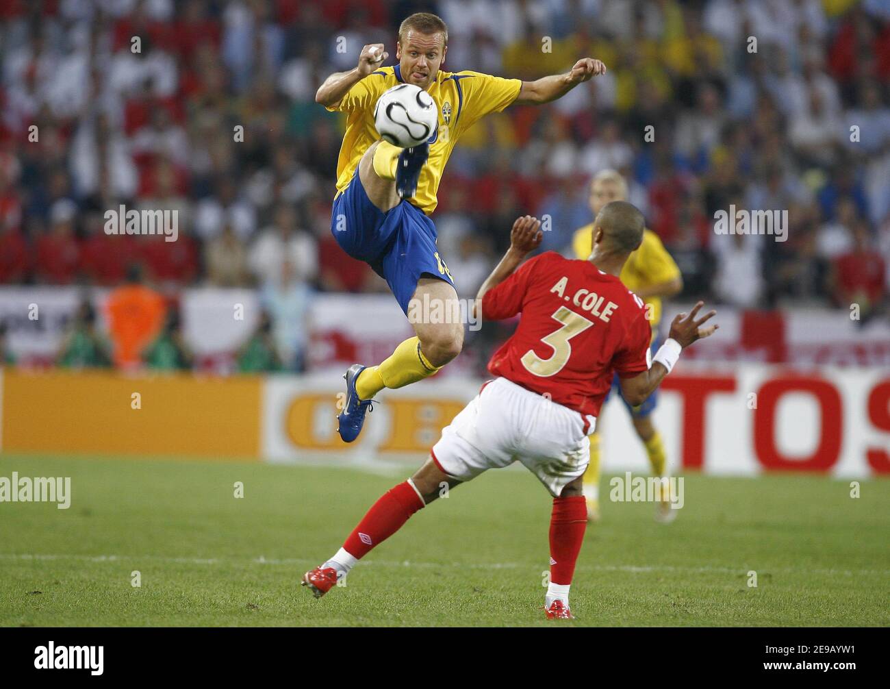 Sweden's Mattias Jonson and England's Ashley Cole during the World Cup 2006, Group B, Sweden vs England at the Rhein-Energie-Stadion Stadium in Cologne, Germany on June 20, 2006. The match ended in 2-2 draw. Photo by Christian Liewig/ABACAPRESS.COM Stock Photo