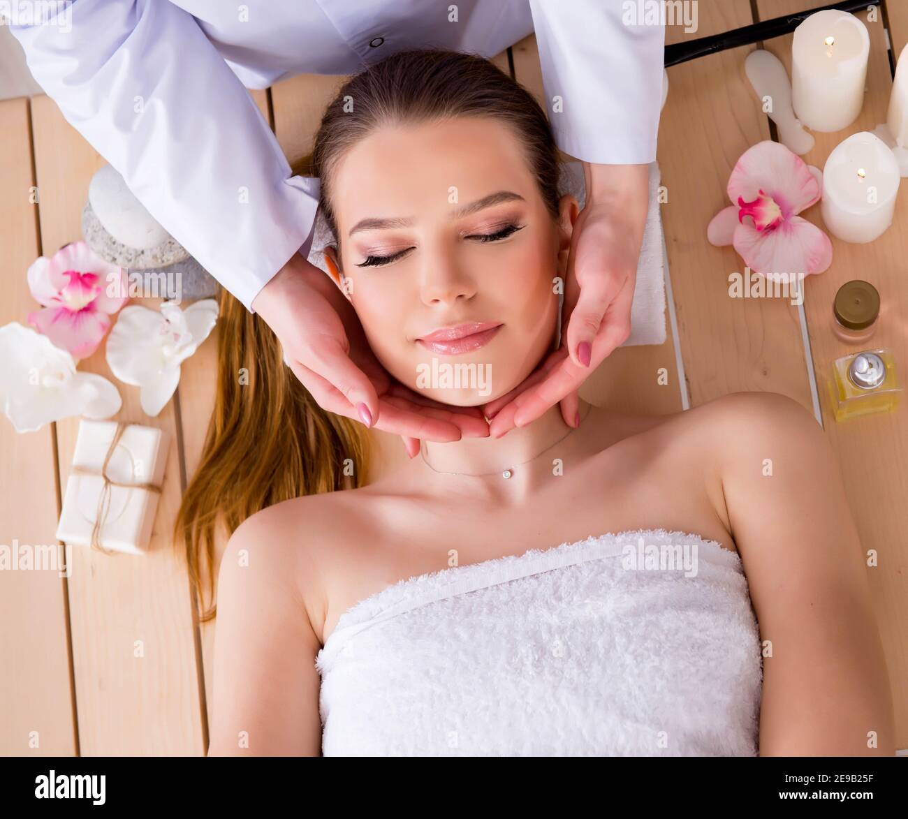 The young woman during spa procedure in salon Stock Photo Alamy