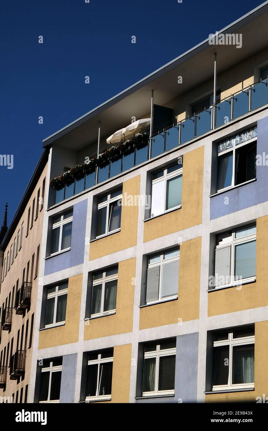 Vertical shot of a modern residential building under a clear sky ...