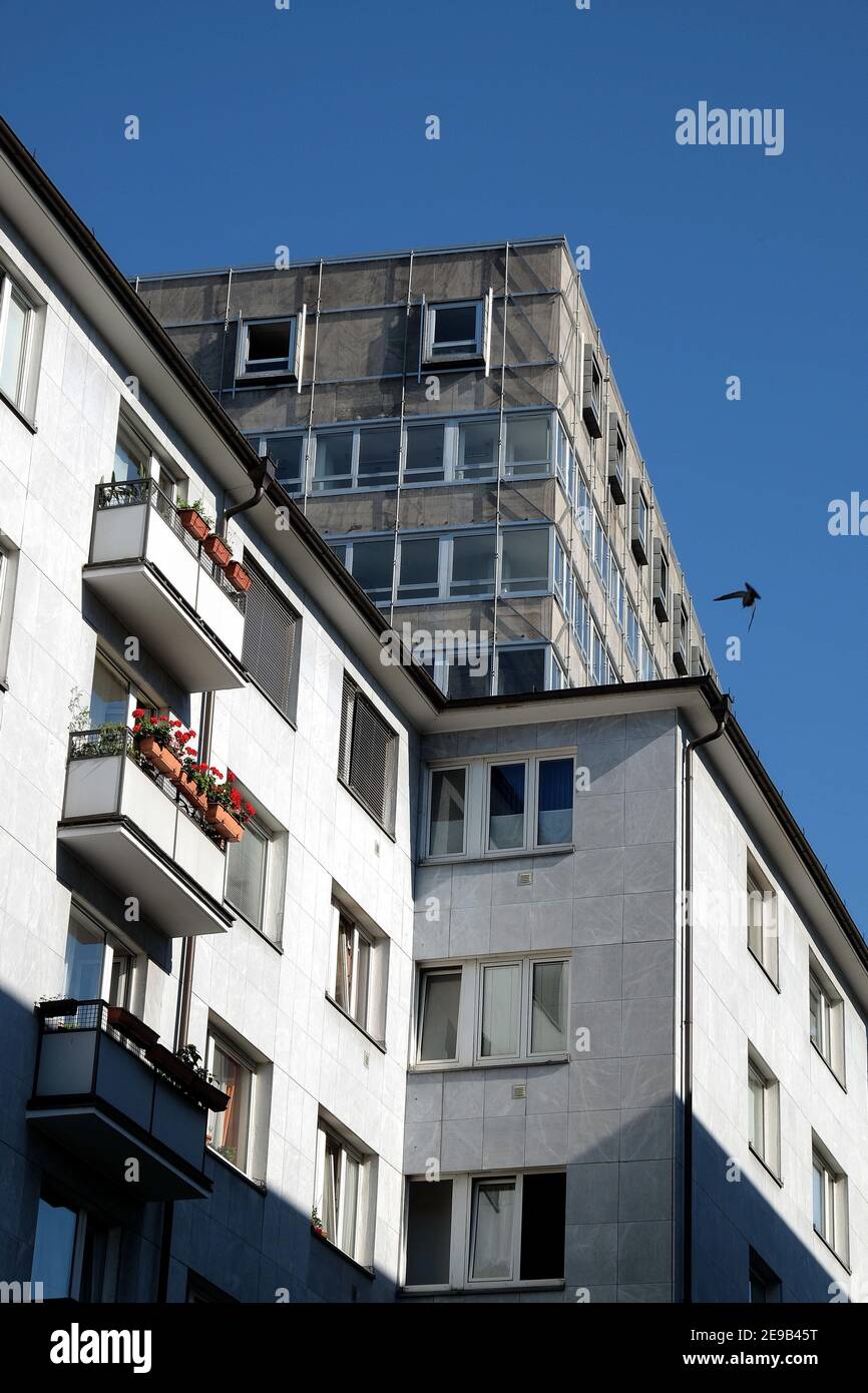 Vertical shot of a modern residential building under a clear sky ...