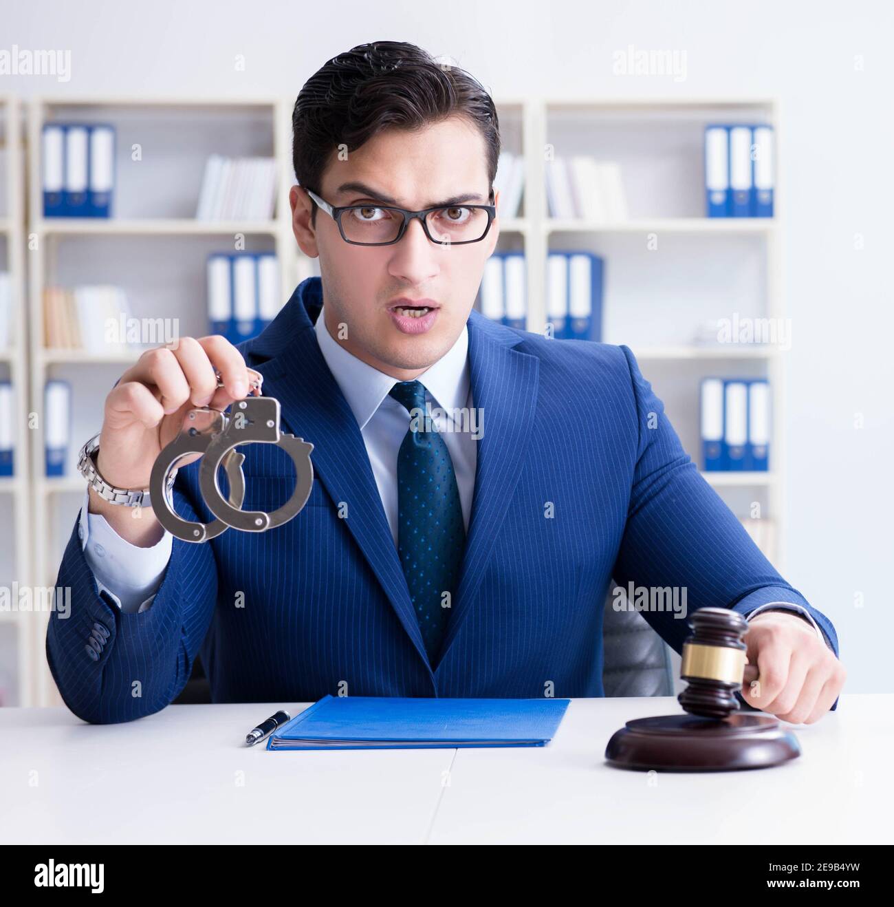 The young lawyer judge sitting in the office Stock Photo