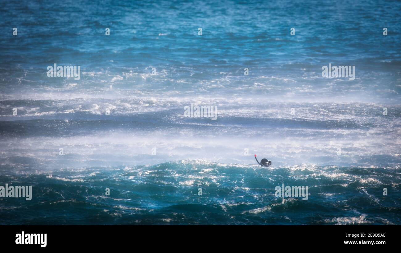 rescue-swimmer-hanging-from-helicopter-high-resolution-stock