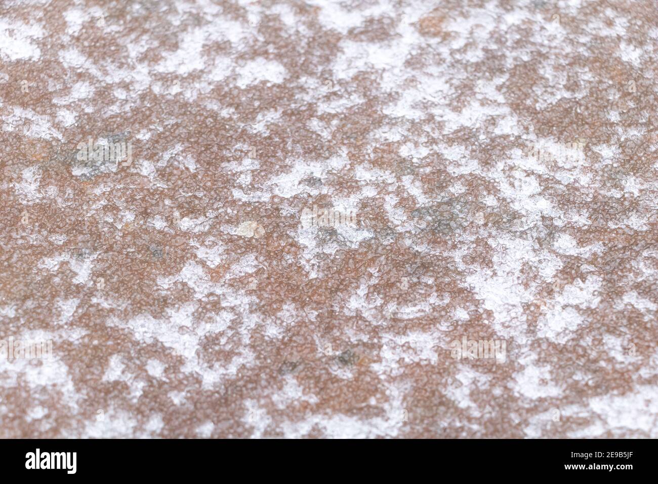 Ice texture - melted snow on a sheet of metal Stock Photo - Alamy