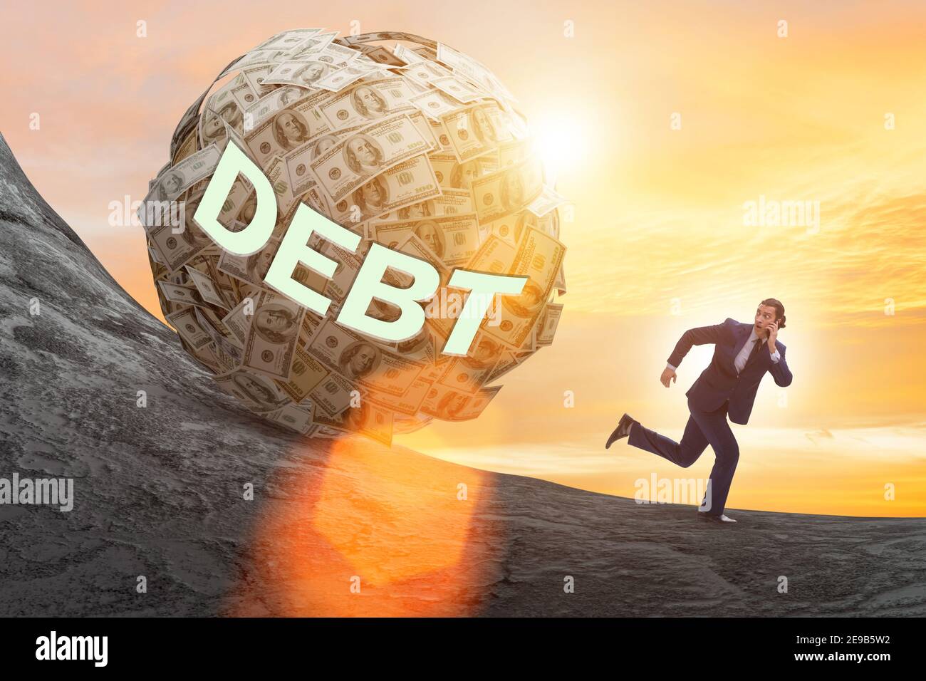 Businessman running away in the debt and loan concept Stock Photo - Alamy