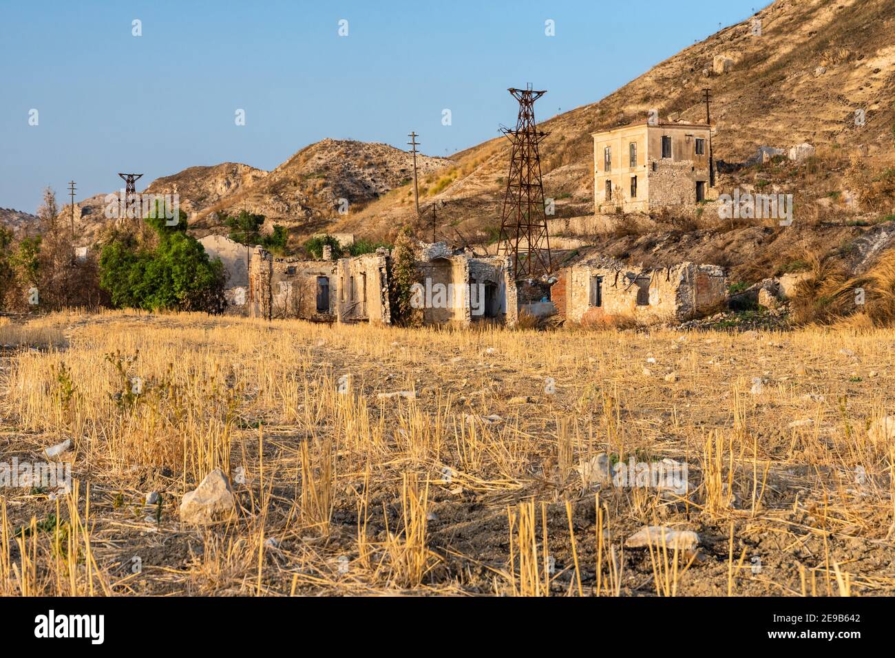 Abandoned buildings and machinery of the mining complex Trabia Tallarita in Riesi, near Caltanissetta, Italy Stock Photo