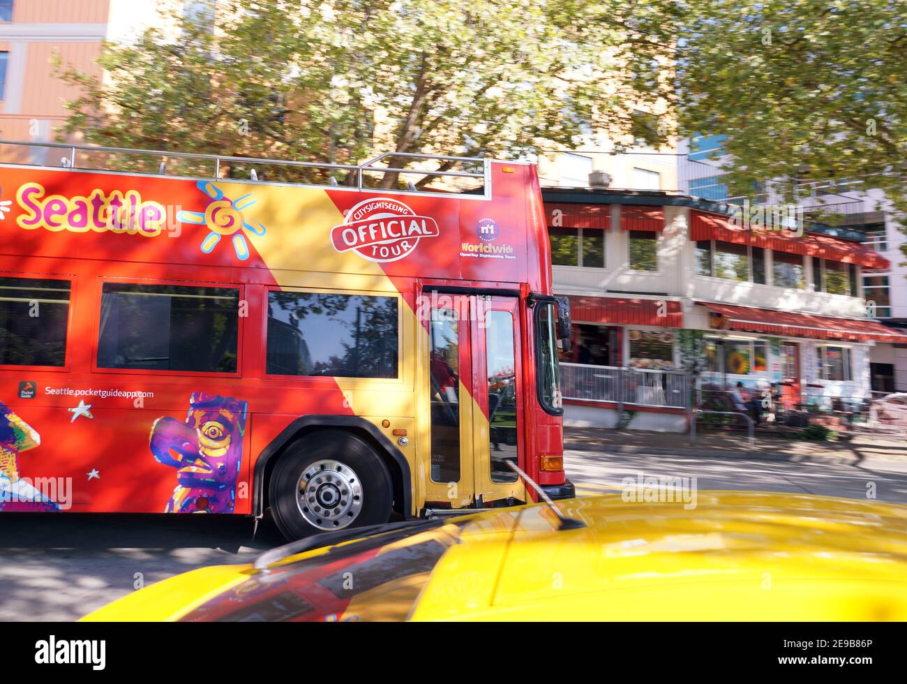 Hopon, hop off. A City Sightseeing bus traveling through the streets of Seattle. US. August 2019. Stock Photo