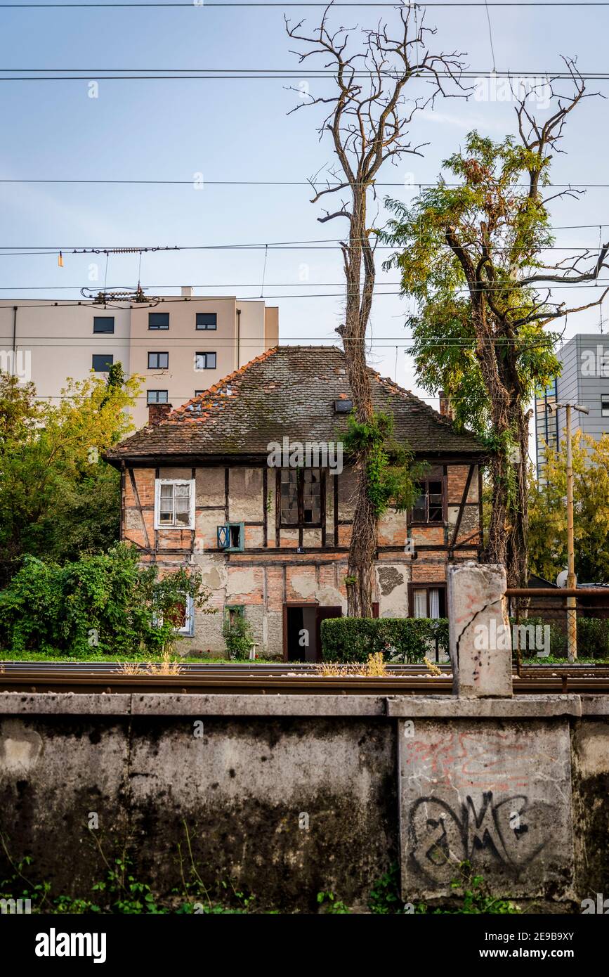 Dilapidated house next to railway line, Zagreb, Croatia Stock Photo