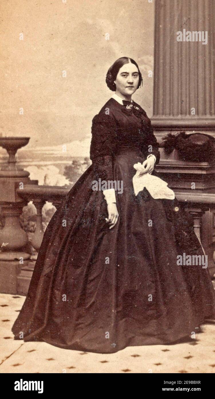 Adele Douglas, widow of Illinois senator Stephen A. Douglas, in mourning dress with handkerchief in front of painted backdrop), 1861 Stock Photo