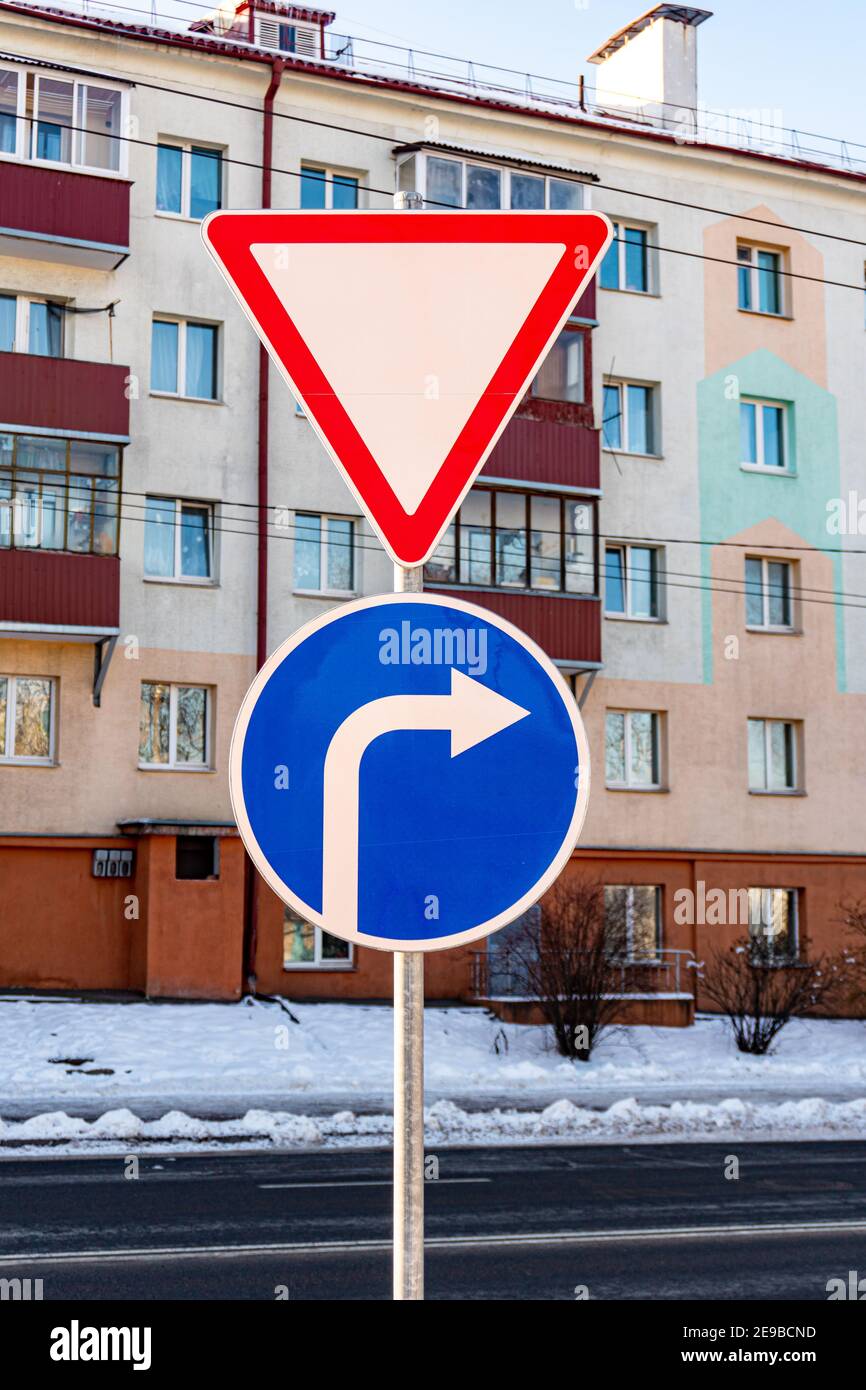 Road sign give way and Turn right Stock Photo Alamy
