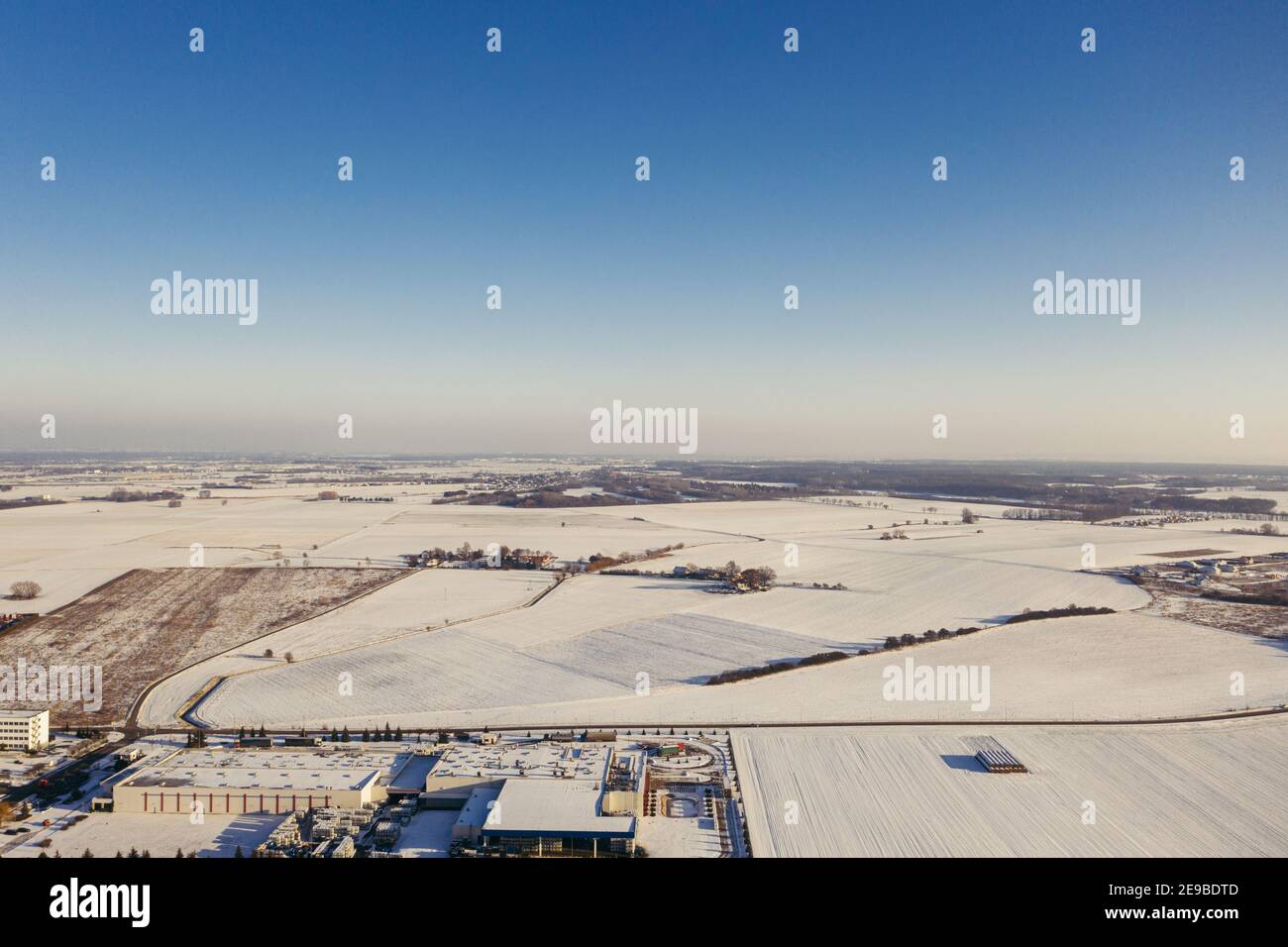 Aerial view of the logistic distribution center in Central Europe during winter season. Stock Photo