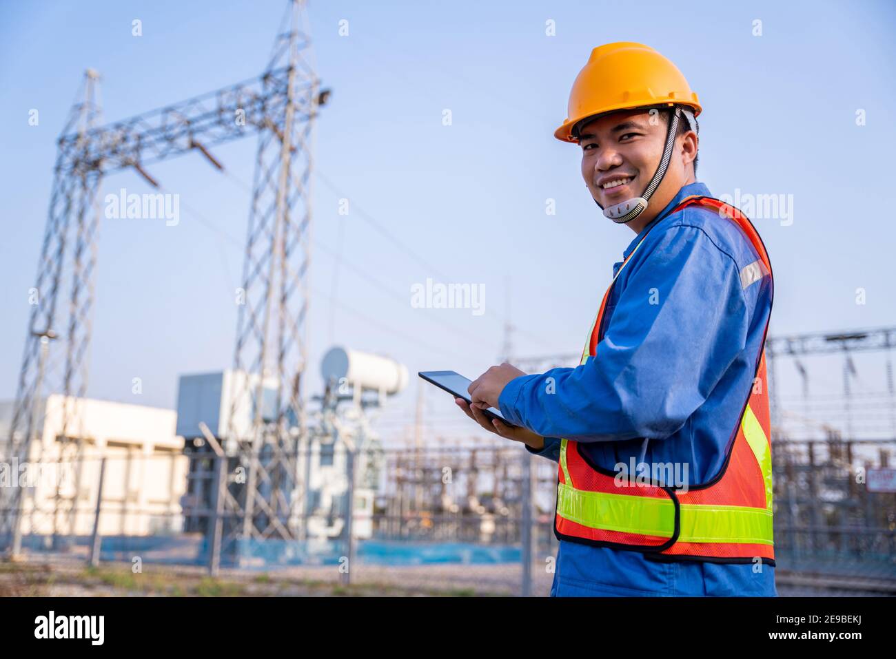 Happy asian electric engineer check the transmission station Stock ...