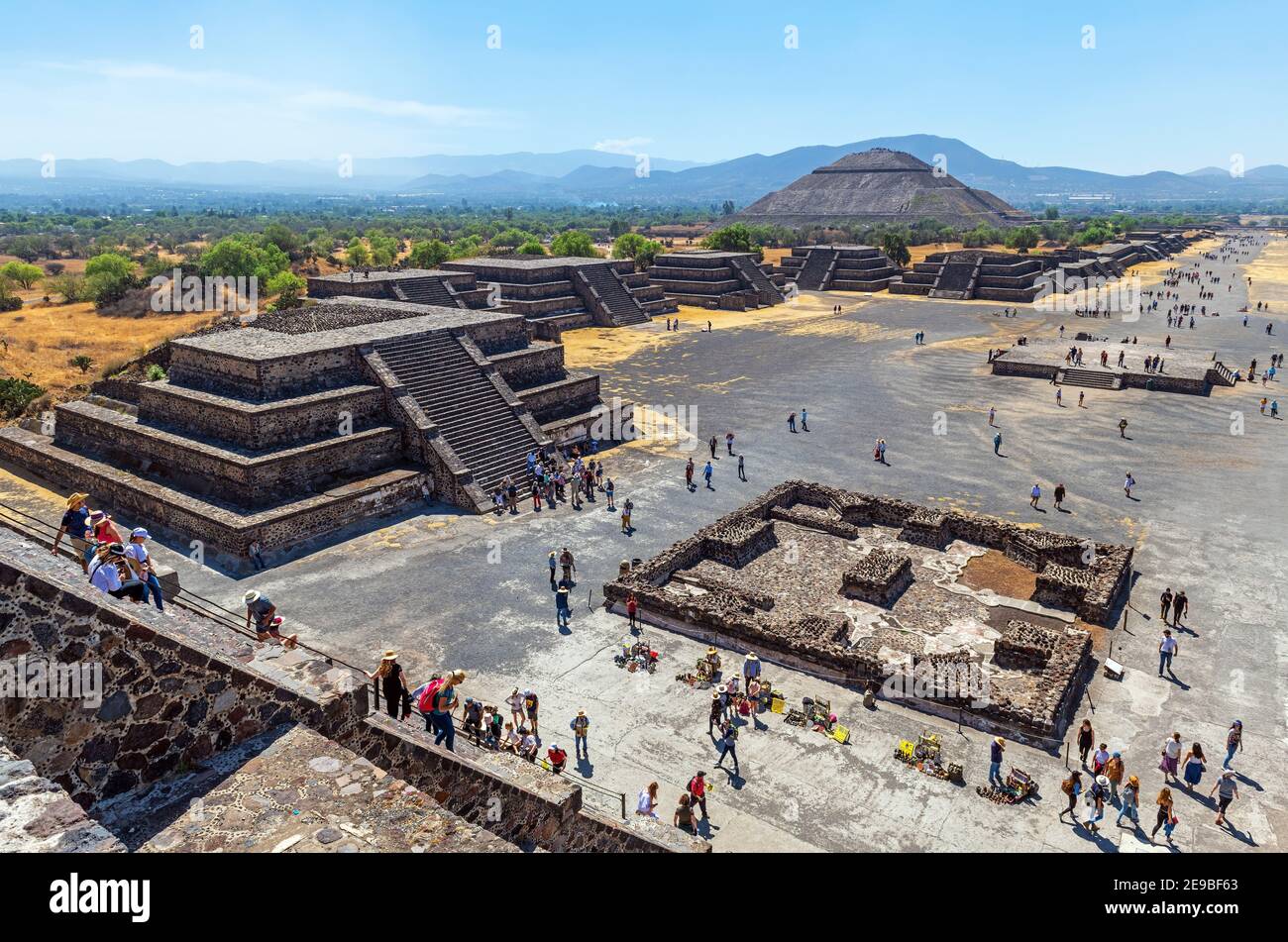 Tourists climbing the Moon Pyramid with Sun Pyramid and Alley of the Dead near Mexico City, Teotihuacan, Mexico. Stock Photo