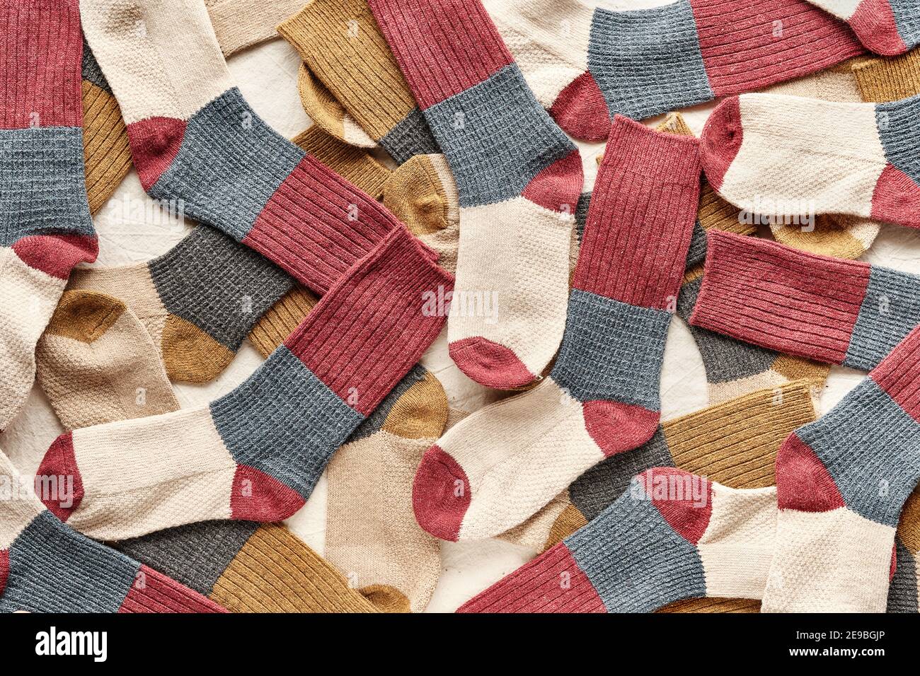 Background with many socks. National Sock day or Odd Socks Day