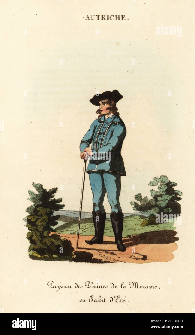 Moravian peasant, Czech Republic, 18th century. He wears a tricorn, Hungarian half-boots, blue jacket with red facings and white border, blue waistcoat and pantaloons, leather belt and haversac. Peasant of the lowlands of Moravia in summer dress, Paysan des plaines de la Moravie en habit d'ete. Handcoloured copperplate engraving after an illustration by William Alexander from J-B. Eyries’ L'Autriche: Costumes, Moeurs et Usages des Autrichiens, Austria: Costumes, Manners and Mores of the Austrians, Librairie de Gide Fils, Paris, 1823. Stock Photo