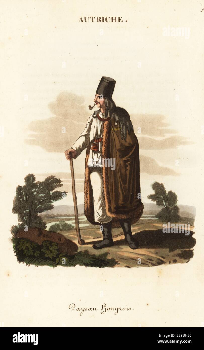 Hungarian peasant, 18th century. In tall felt hat, sheepskin coat with lambskin back, white hemp pantaloons and shirt. He carries a stick called a Tschakane. Paysan Hongrois. Handcoloured copperplate engraving after an illustration by William Alexander from J-B. Eyries’ L'Autriche: Costumes, Moeurs et Usages des Autrichiens, Austria: Costumes, Manners and Mores of the Austrians, Librairie de Gide Fils, Paris, 1823. Jean-Baptiste Eyries (1767-1846) was a French geographer, author and translator. Stock Photo