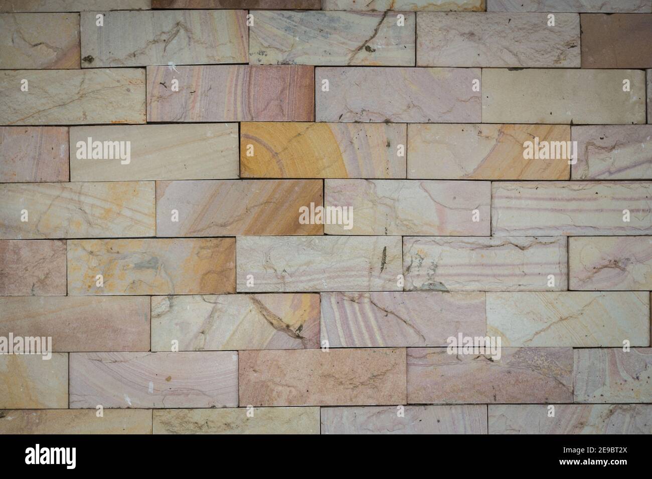 stone wall made with blocks background Stock Photo - Alamy